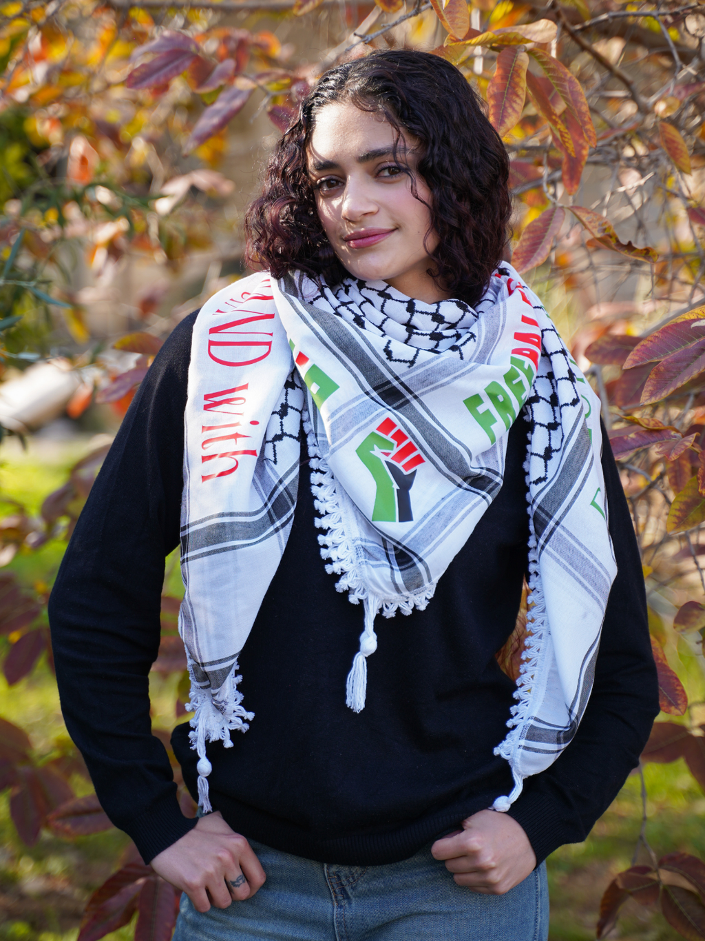 Our Model with Kufiya and Solidarity Prints on it