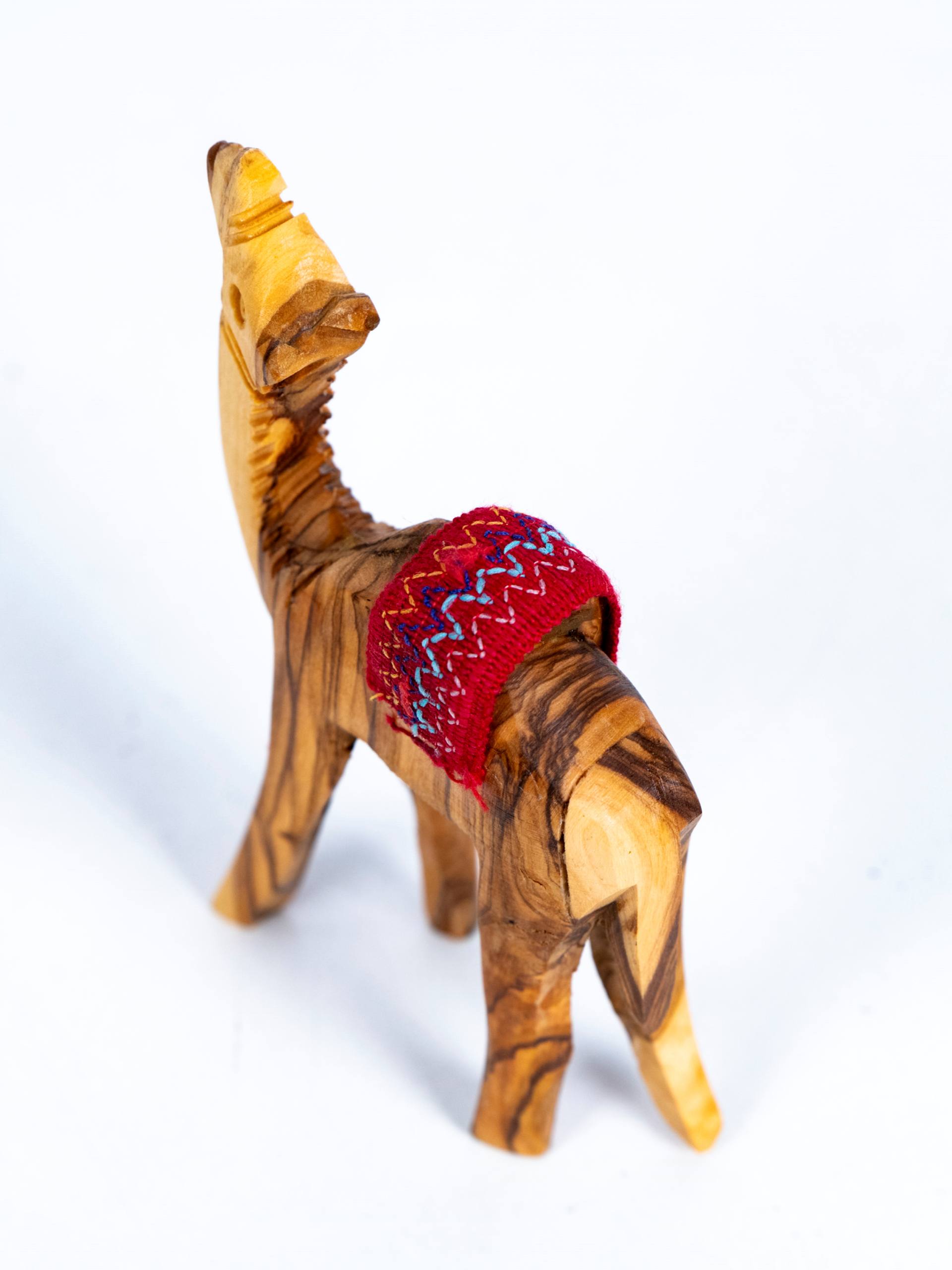 Kleines Kamel mit Stoffsattel - Aus Olivenholz